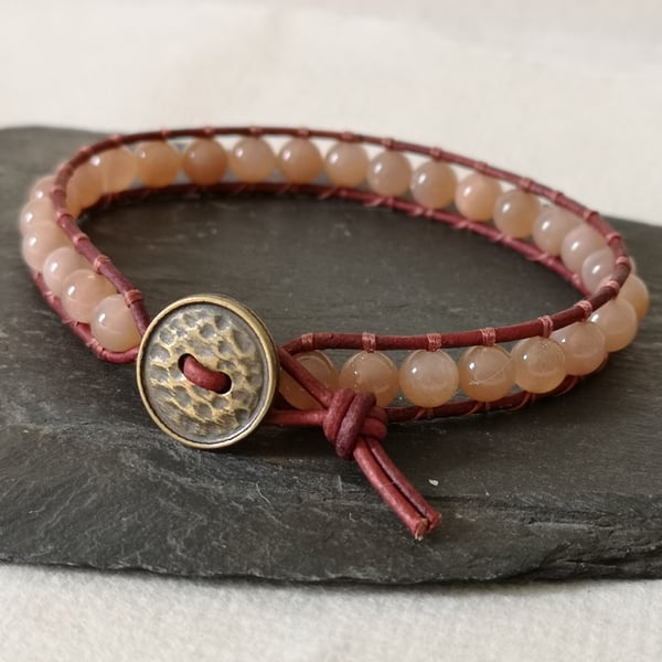 Sunstone and red leather bracelet with leopard print button fastener