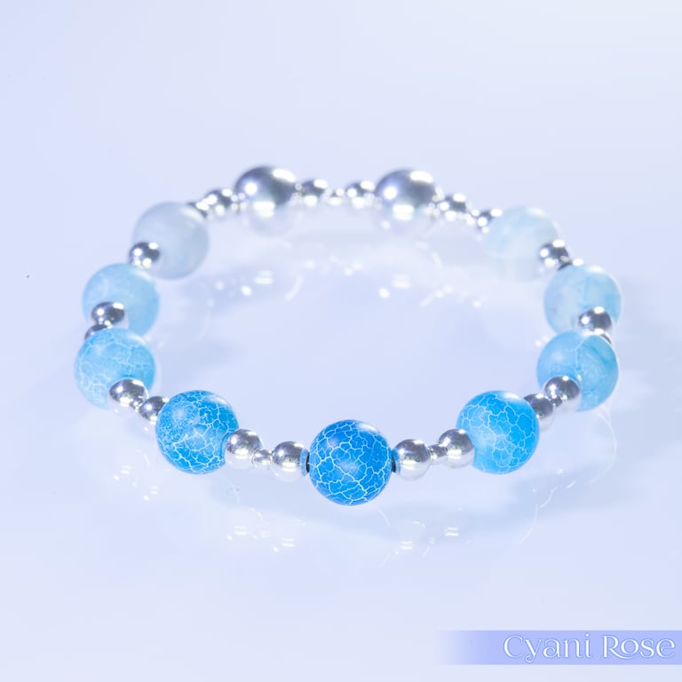 Bracelet sterling silver and crackle glass in blues stretch beaded handmade