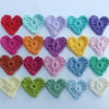 20 small crochet hearts, appliques and embellishments
