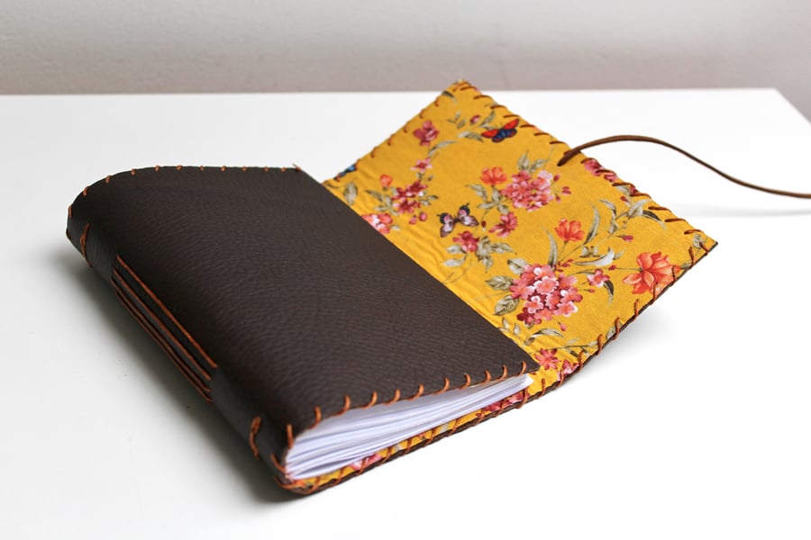 A6 Fold Over Brown Leather handmade notebook floral fabric lining plain paper 