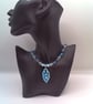 Necklace with Blue and Clear Bicone Beads and a Shell Pendant, Blue Pendant - Image 5