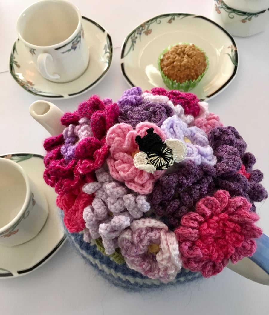 pink and purple flower crochet tea cosy