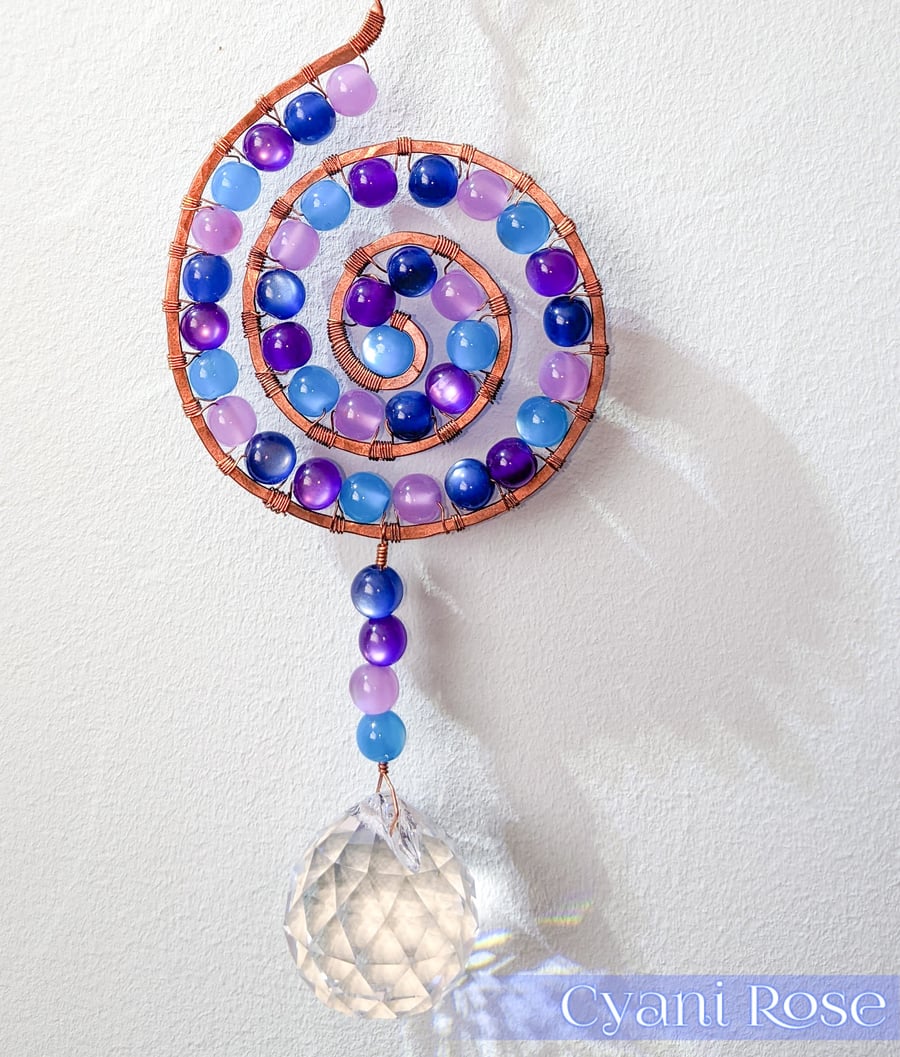 Suncatcher copper wire wrapped spiral shape with purple & blue beads