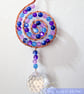 Suncatcher copper wire wrapped spiral shape with purple & blue beads - Image 1