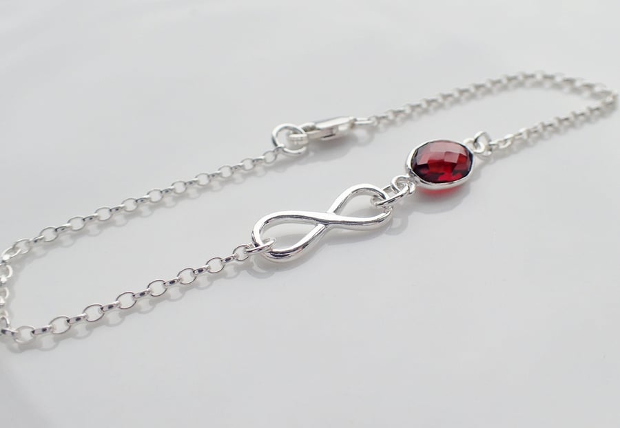 Garnet sterling silver infinity bracelet, January birthstone gift