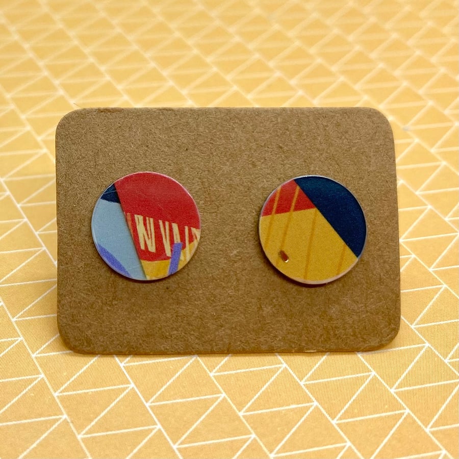 Recycled plastic graphic yellow, orange and blue disc studs