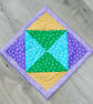 Coaster Set - four coasters with Green, Yellow, Blue and Purple stars fabric. - Image 3