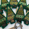 Green and gold seasonal up cycled Christmas tree home decoration.