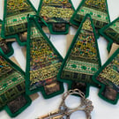 Green and gold seasonal up cycled Christmas tree home decoration.