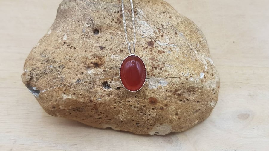 Small oval Red Carnelian pendant. 925 sterling silver. July birthstone necklace.