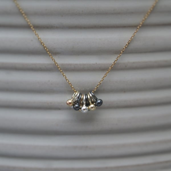 9ct yellow gold, silver and oxidised silver tiny seed ball pendants necklace