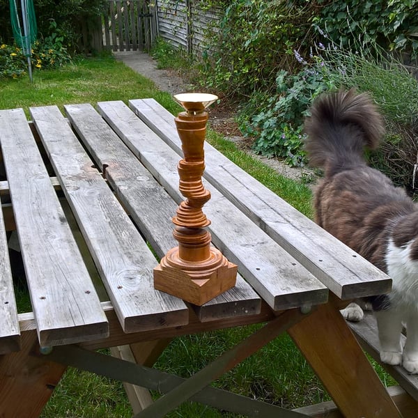 Spiral cherry candle  holderwith an Oak square base and a solid brass top