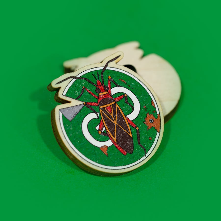 Go with cotton stainer bug - wooden pin brooch