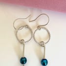 Hematite and silver drop earrings.