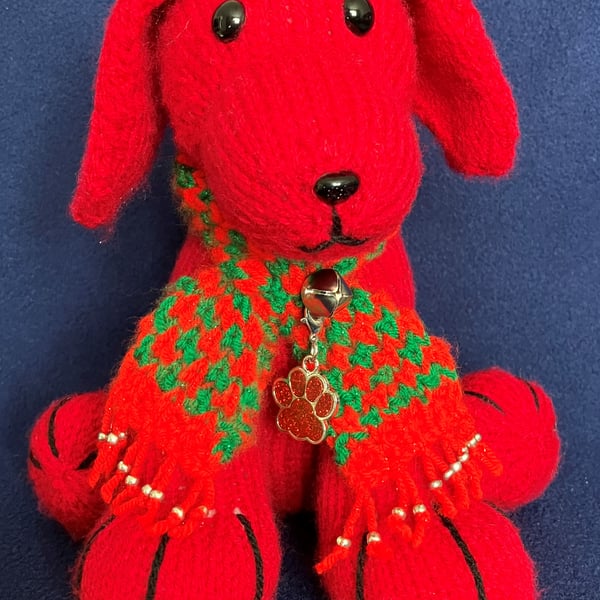 Red Dog wearing a knitted scarf