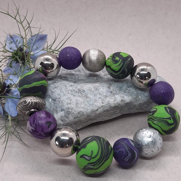 Polymer clay bracelet in green, black and purple