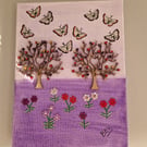 Trees,  flowers and butterflies. 