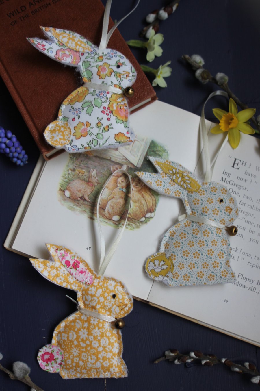 Easter bunny trio made from recycled fabrics in shades of yellow