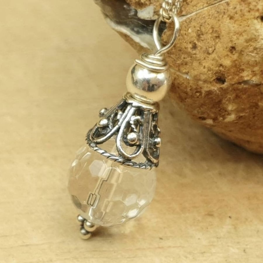 Small clear quartz cone pendant necklace. April Birthstone