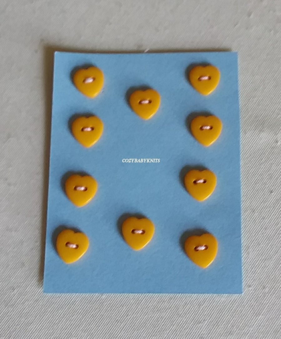 Mustard yellow heart buttons