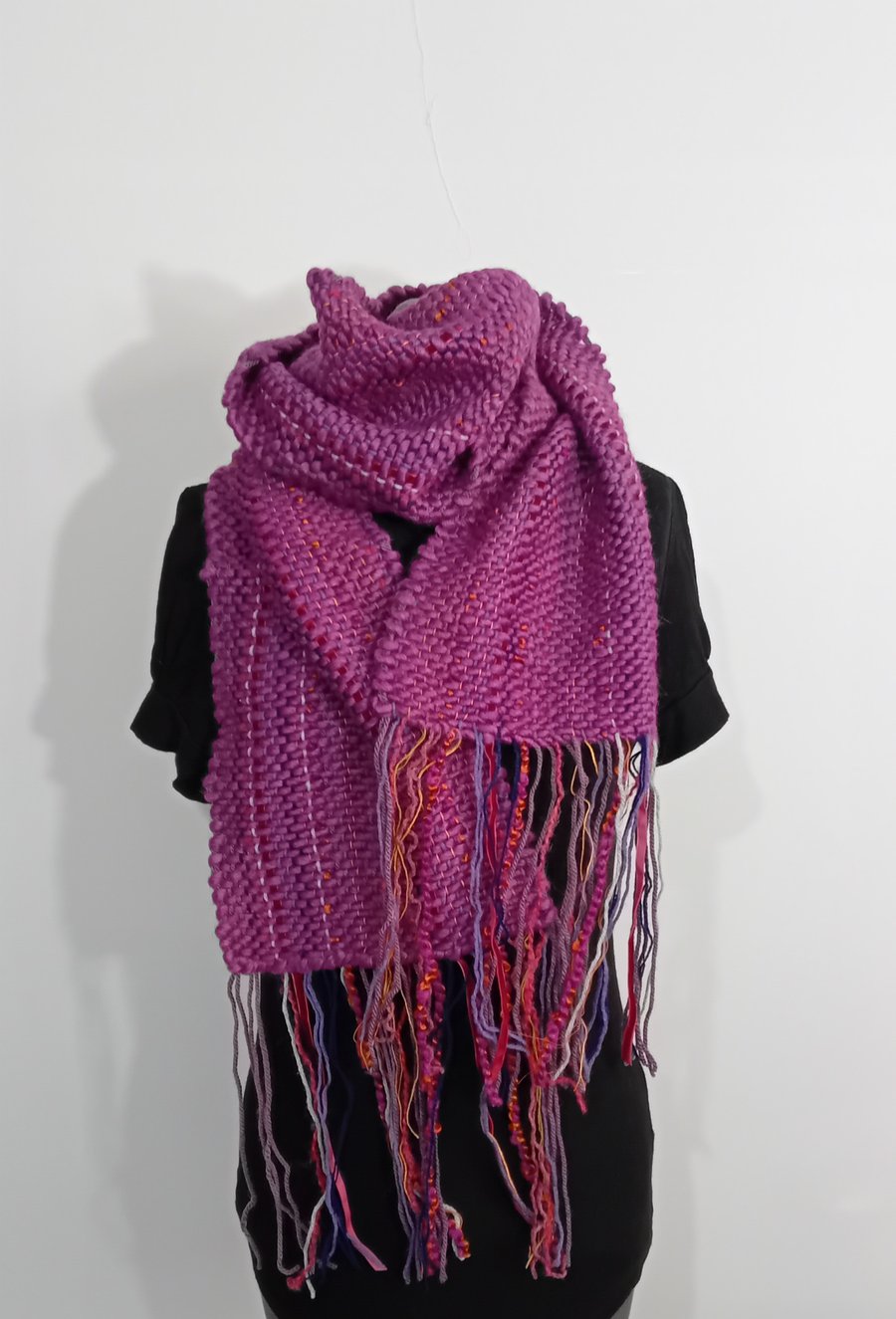 Handwoven Multicoloured Textured Scarf in a Mix of Synthetic Yarn..