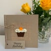 Birthday card. Chocolate cupcake with orange flower. Wool felt. Handmade Card.