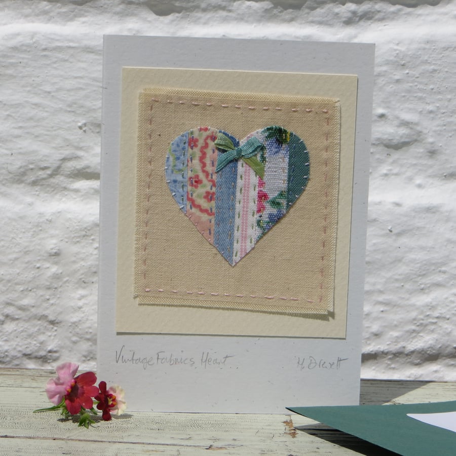 Hand-stitched card, vintage fabrics patchwork with hand-tied silk ribbon bow