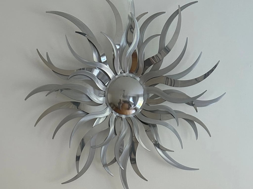 Elegant Sun Ripple Metal Wall Piece