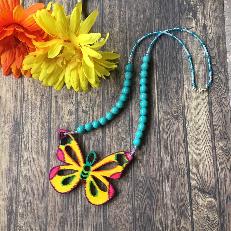 Vibrant wood butterfly turquoise necklace