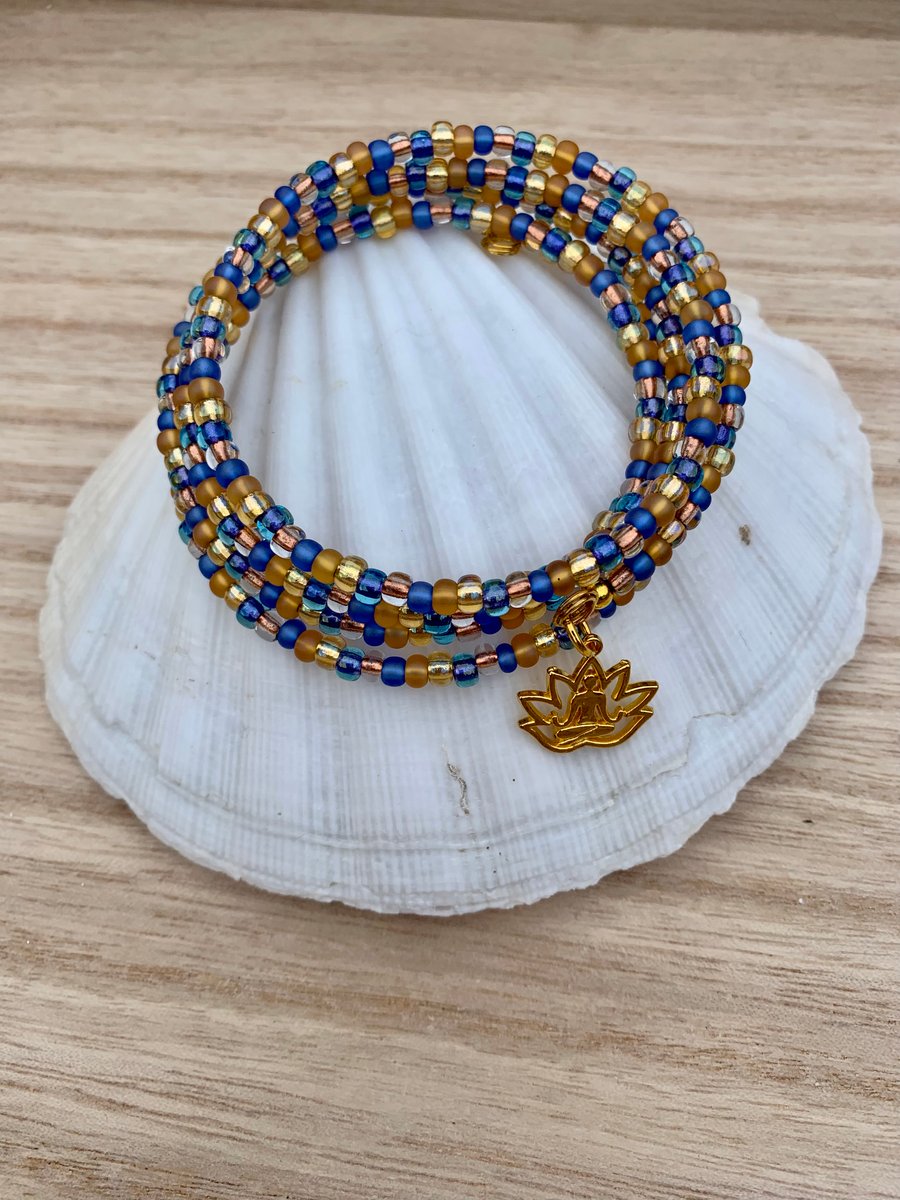 Multi Wrap Bead Bracelet in Gold & Blues, Gold plated Lotus Charm