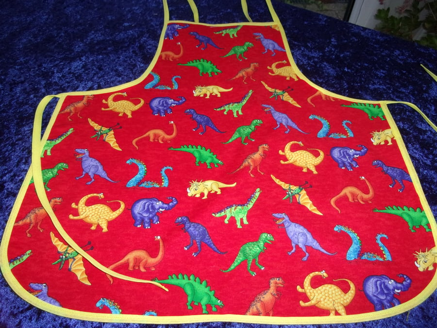 Red Baby Apron with Colourful Dinosaurs