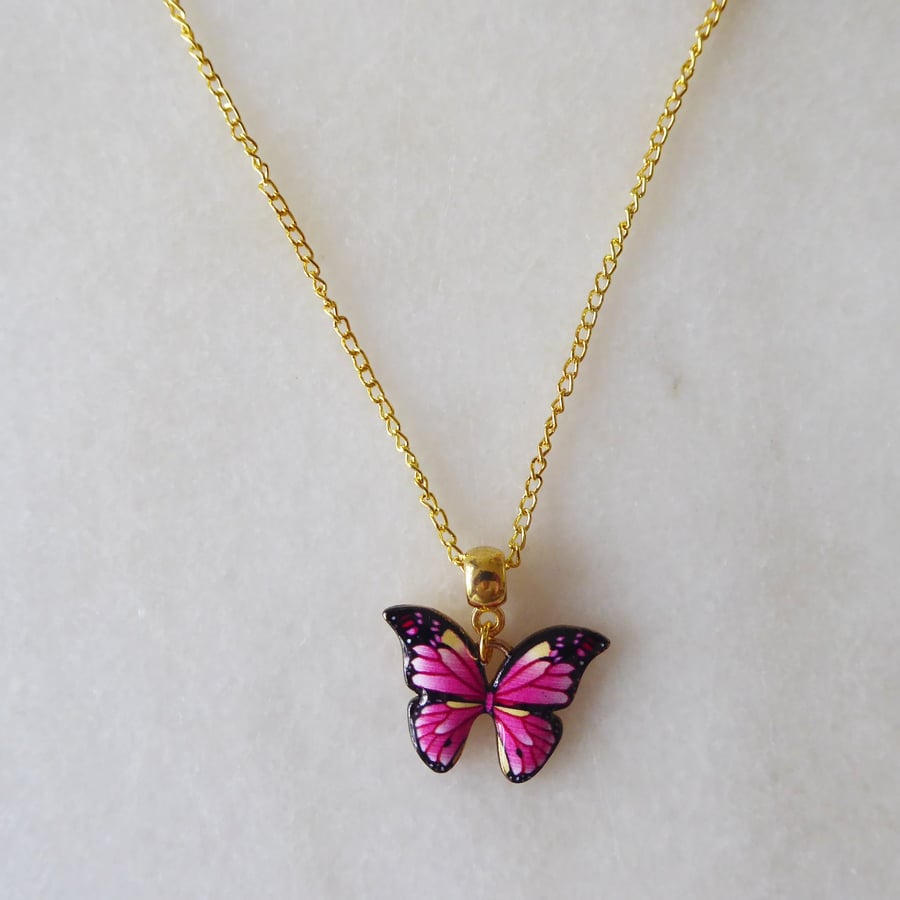 Pink Butterfly Pendant with gold plated Chain