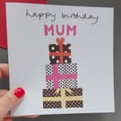 Mum happy birthday card with pile of presents
