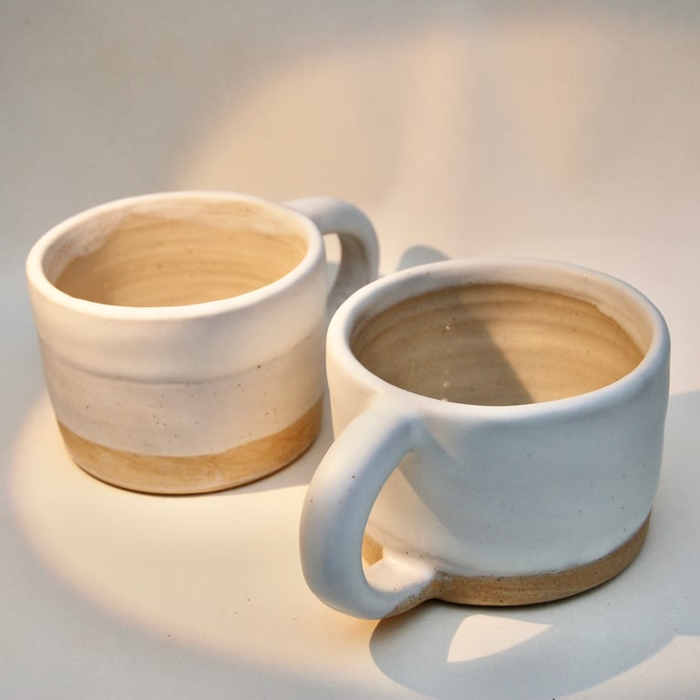 Medium straight sided ceramic mug.