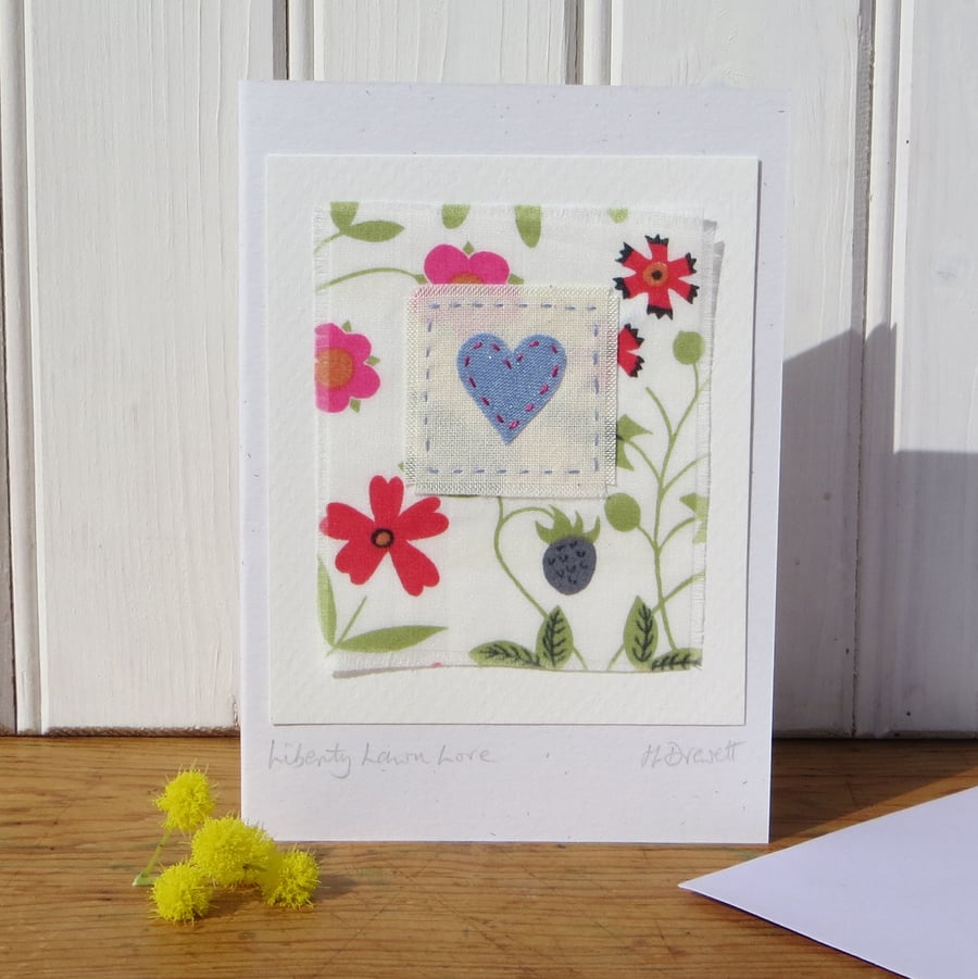 Hand-stitched heart card with cheerful Liberty tana lawn cotton background