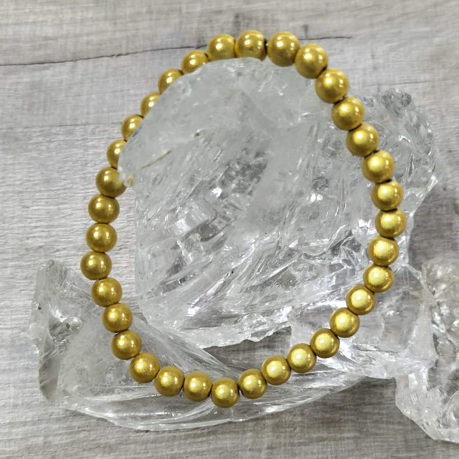 BR480 Yellow miracle bead elasticated bracelet 