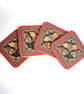 Four Red & Black Patterned Butterfly Cork Coasters - Image 1