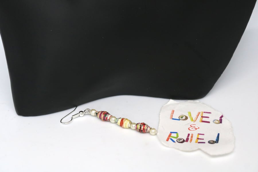 Long thin earrings with small multicoloured paper beads and pearls