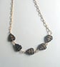 Gold filled chain necklace with black and gold Czech glass  leaf beads - Image 1