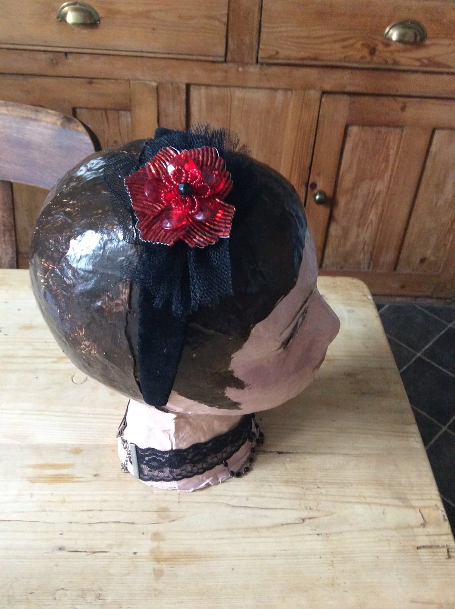 Velvet headband with black tulle and red beaded flower