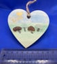 Wooden heart with 'with love' sentiment made using  with sea glass.