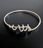 Coiled Spiral Sterling Silver Bangle - Image 1
