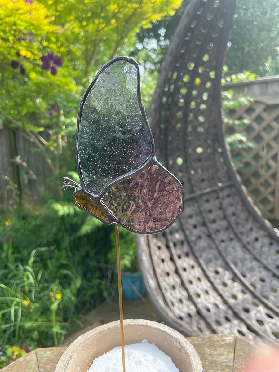 Butterfly plant stake made from stained glass