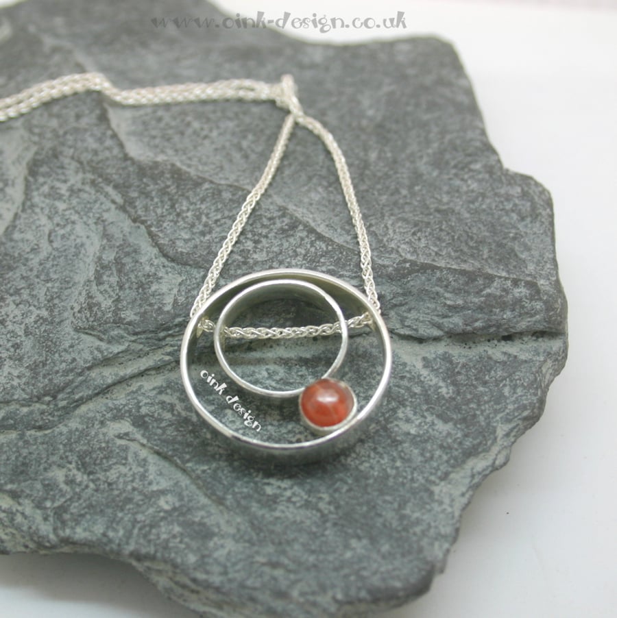 Sterling Silver circles with a Garnet necklace