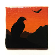 Eagle Magnet - acrylic painted orange sunset scene with bird of prey silhouette