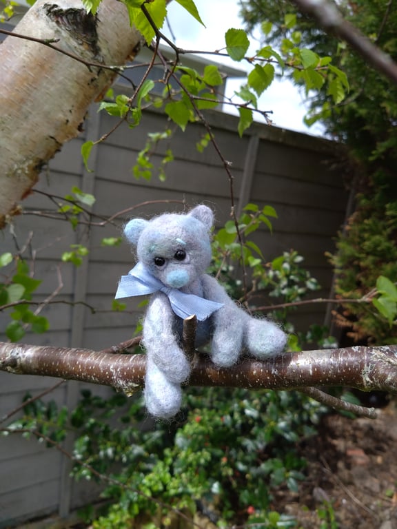 Needle felted tiny teddy bear