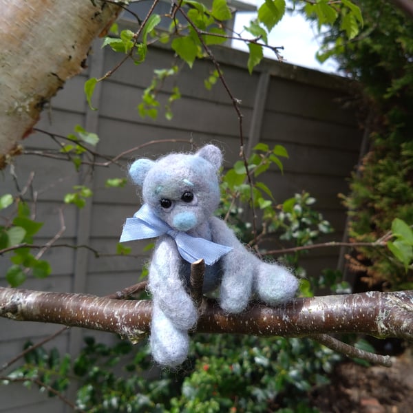 Needle felted tiny teddy bear