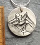 Handmade Ceramic Hare pendant in black white and grey - Image 3
