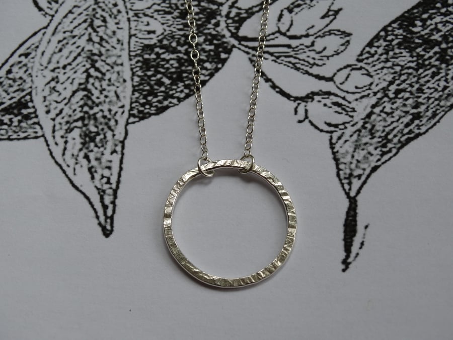 Frost pattern sterling silver hoop pendant