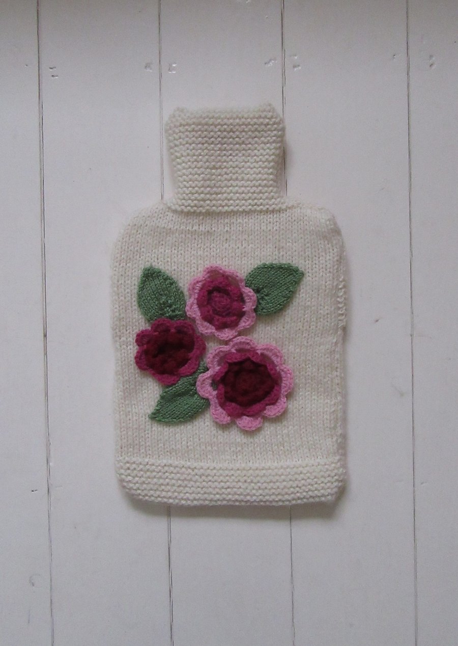 Hand knitted ladies hot water bottle - cream with pink flowers